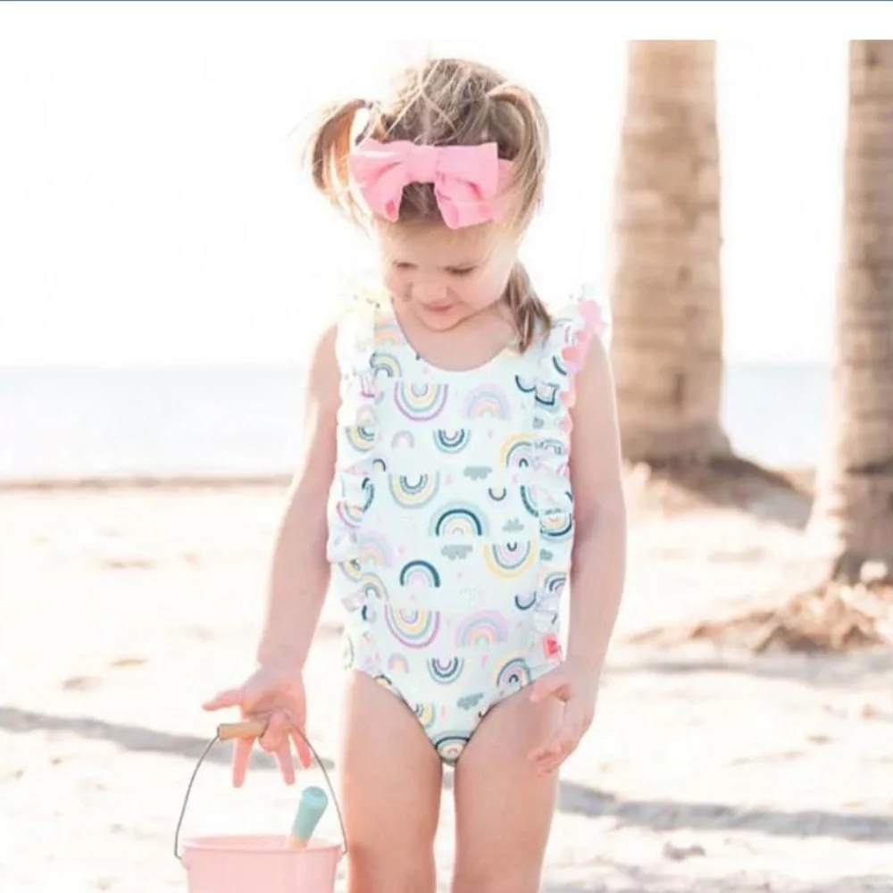 NWT RuffleButts Chase The Rainbow Waterfall Girls One Piece Swimsuit- back bow